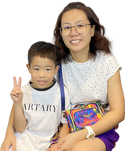 Parent and child pictured with the source Fine Art feedback.