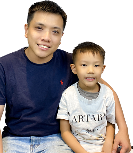 Parent and child pictured with the source Fine Art feedback.
