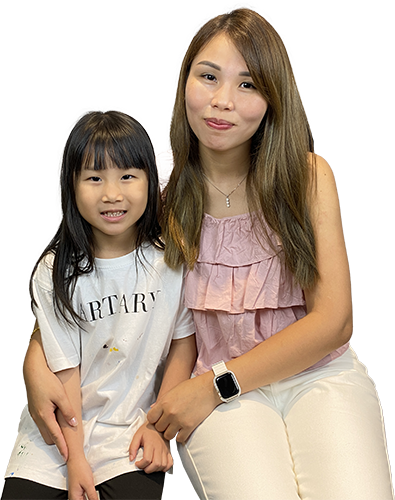 Parent and child pictured with the source Fine Art feedback.