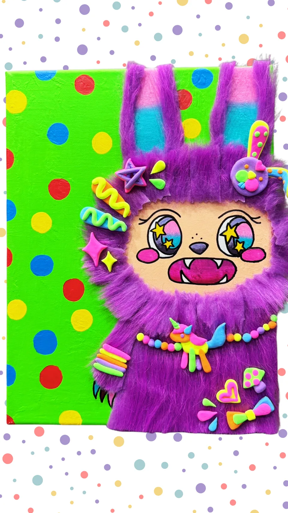 Purple furry monster artwork with colourful clay decorations.